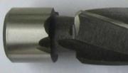 The core drill with a guiding part for drilling tubes